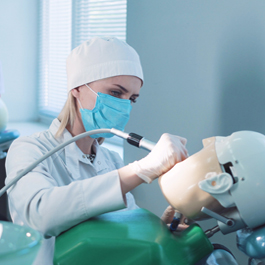 dentist completing training exercise