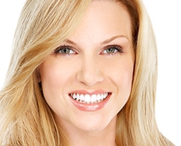 Female Smiling with Straight, White Teeth