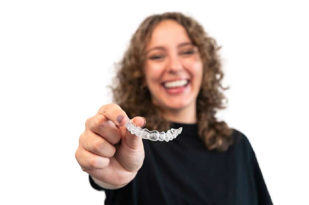 Woman Smiling with Retainer