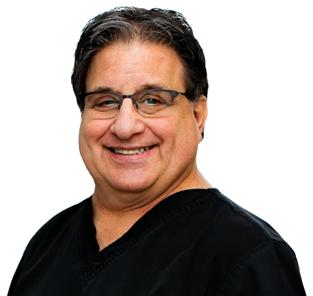 A headshot of Dr. Boris Pinhasov of DeJesus Dental Group.