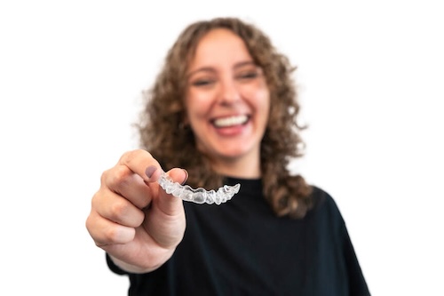 Woman Smiling with Retainer